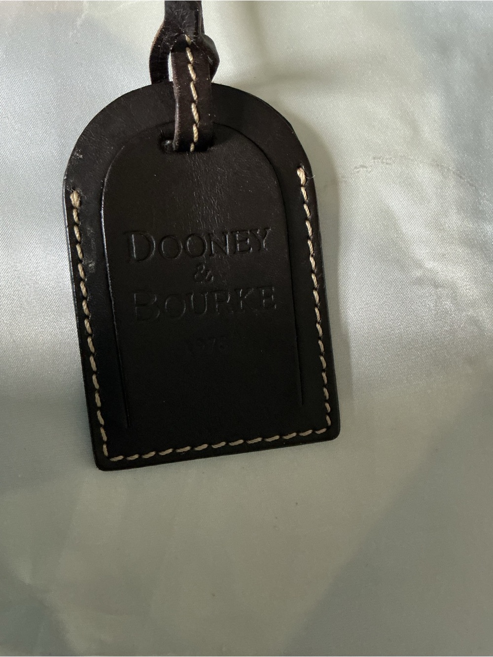 Dooney & Bourke Black Leather Luggage Tag with Contrast Stitching